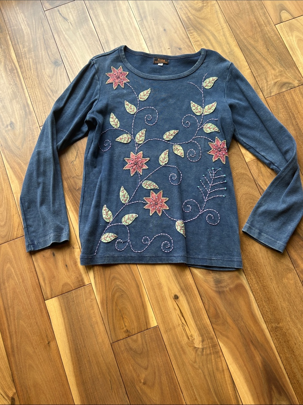 Rising International Navy Long Sleeve Top with rust and green Floral Appliqués